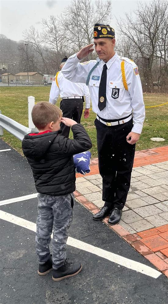 Flag was refolded and returned to his family.